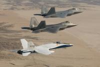Dick flying the F-18 with F-22s